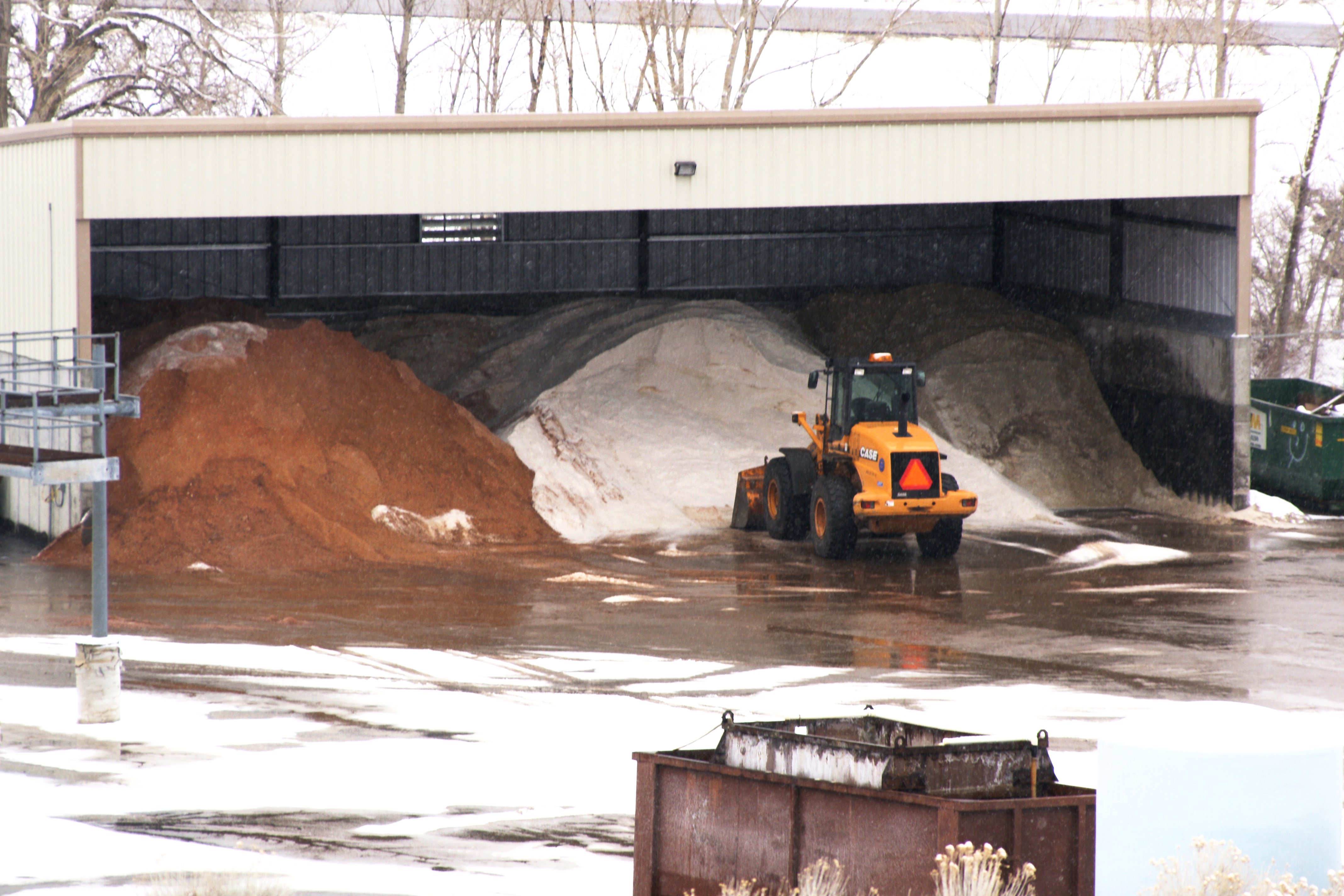 Deicing stockpiles in a snow fighting shed